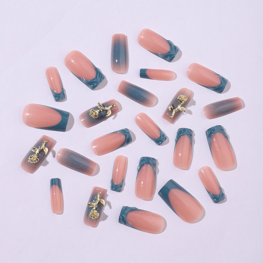 Elegant artificial nail creations with golden embellishments Kalsten