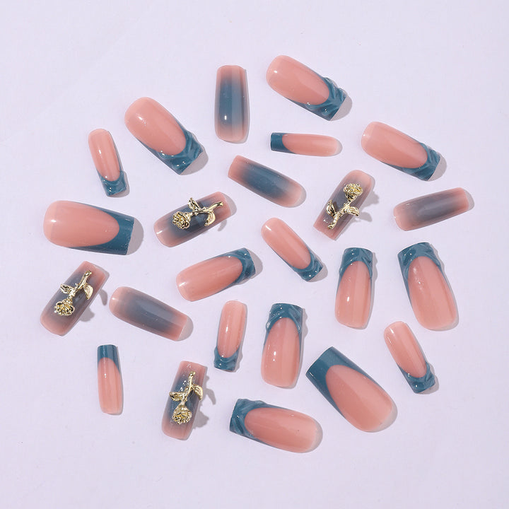 Elegant artificial nail creations with golden embellishments Kalsten