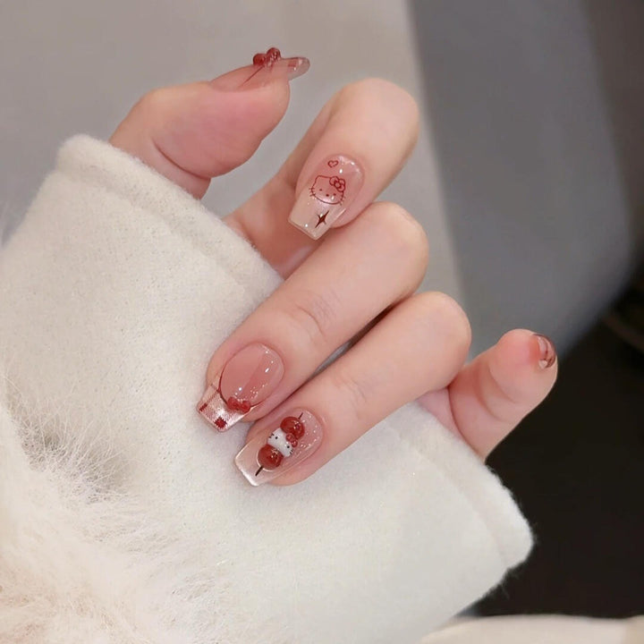 Artificial nails with playful Hello Kitty design Kalsten