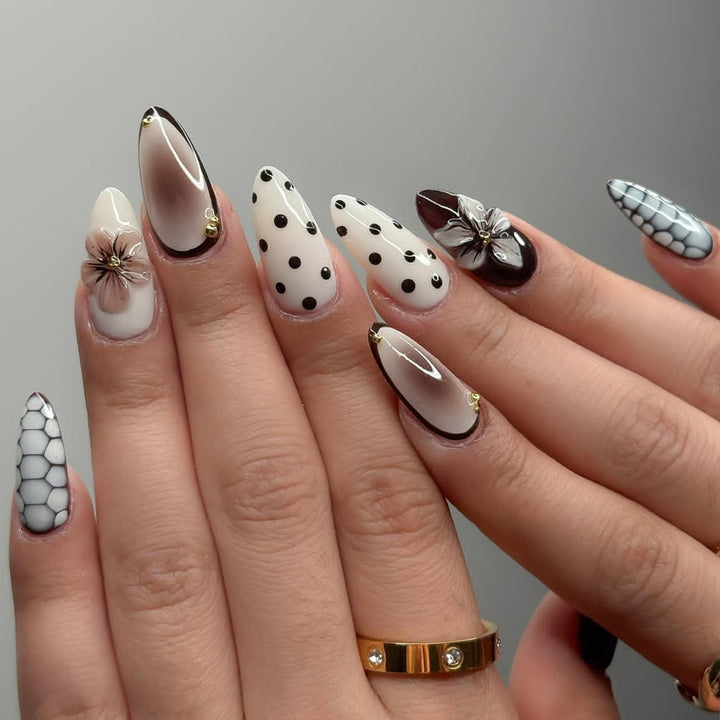 Designer artificial nails with floral and geometric accents Kalsten