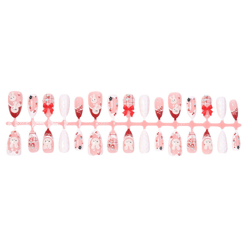 Creative acrylic nail set with playful bunny and gift designs Kalsten