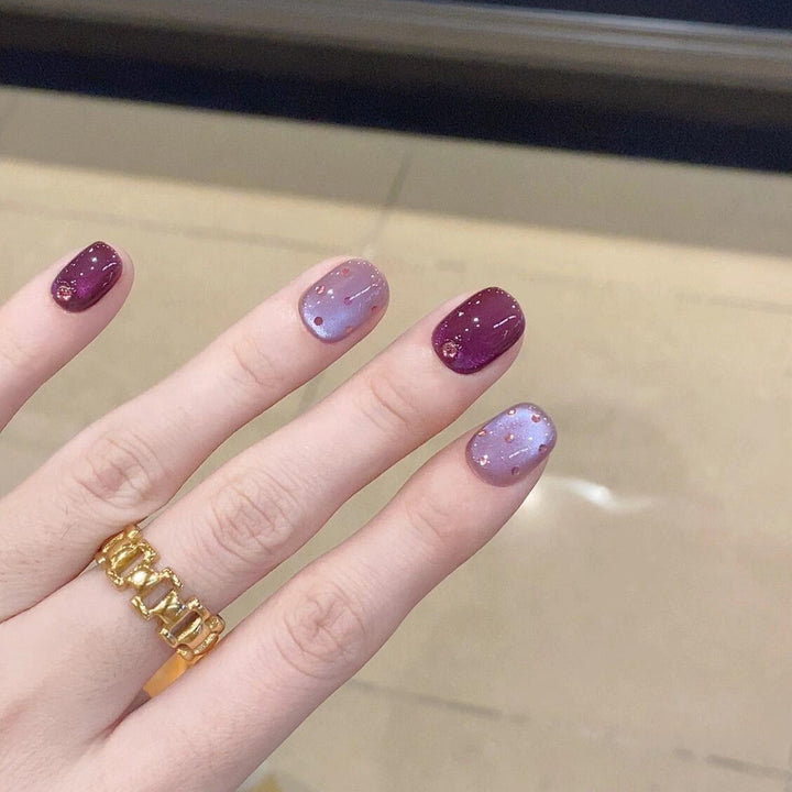 Artificial nails with unique glitter accents Kalsten