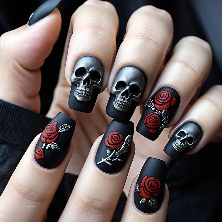 Creative nail art with skull and rose designs Kalsten
