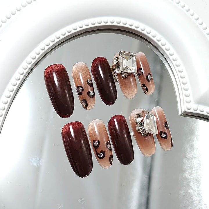 Luxury artificial nails with elegant rhinestone applications Kalsten