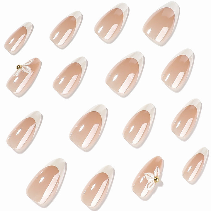 Artful stiletto nails with elegant floral design Kalsten