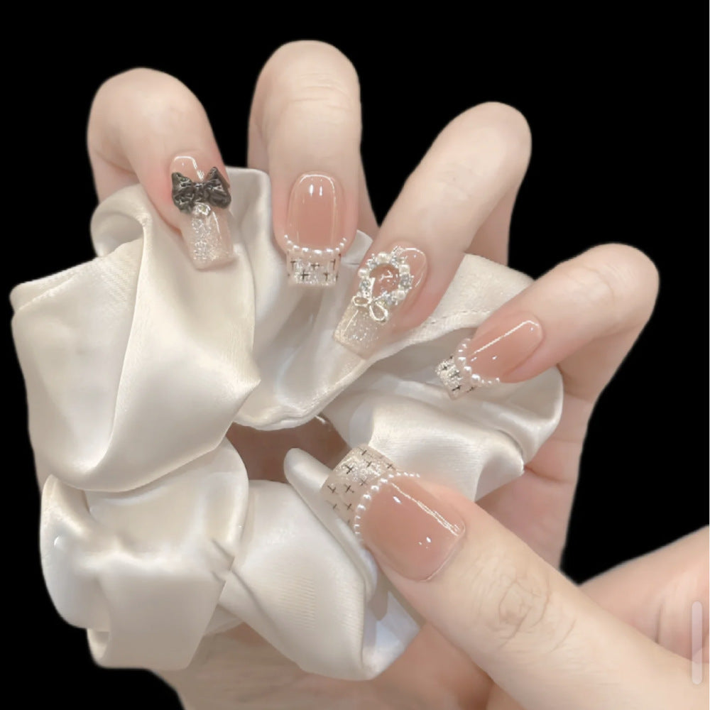 Glamorous artificial nails with sparkling decorations Kalsten