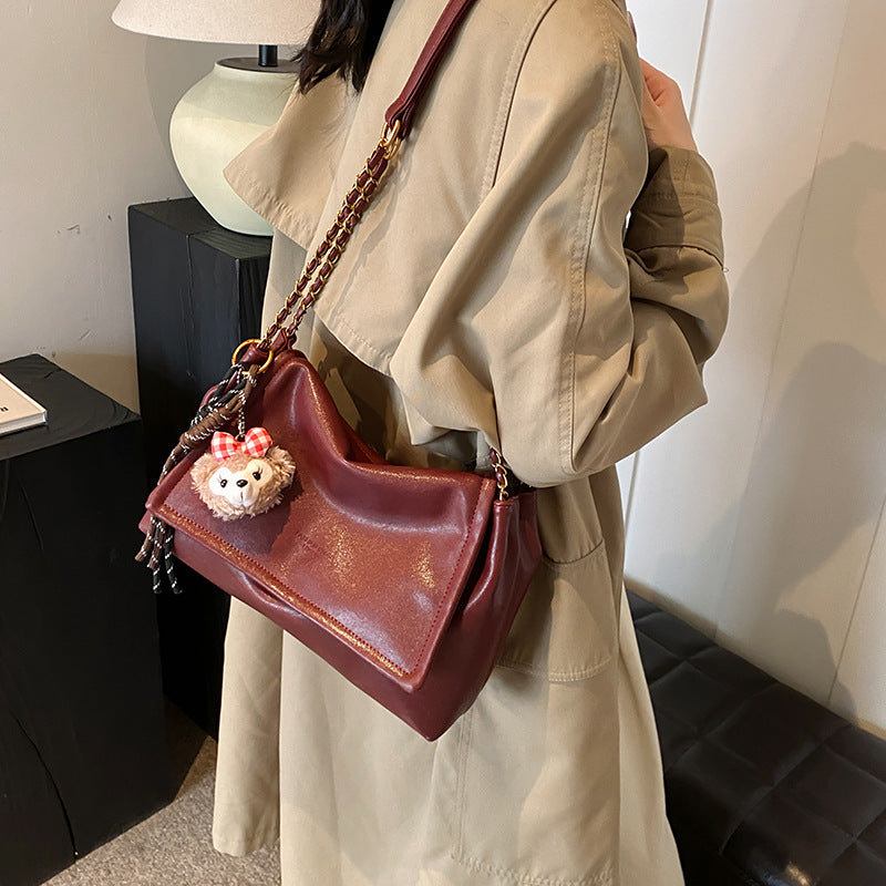 Elegant Chain-Handled Handbag Kalsten