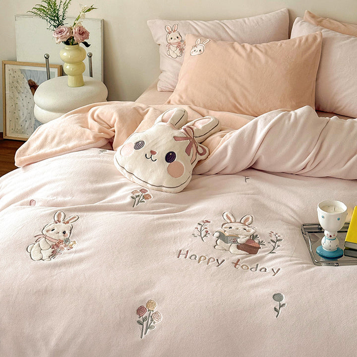 Cute children's bedding set made of soft cotton terry with embroidered cat appliqués and cuddly plush pillow.
