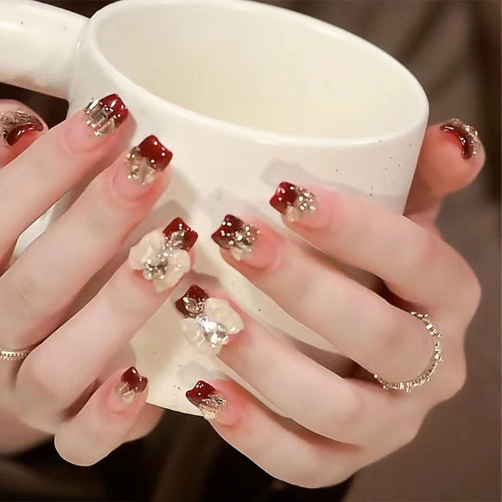 Artificial nails with glamorous floral decorations Kalsten