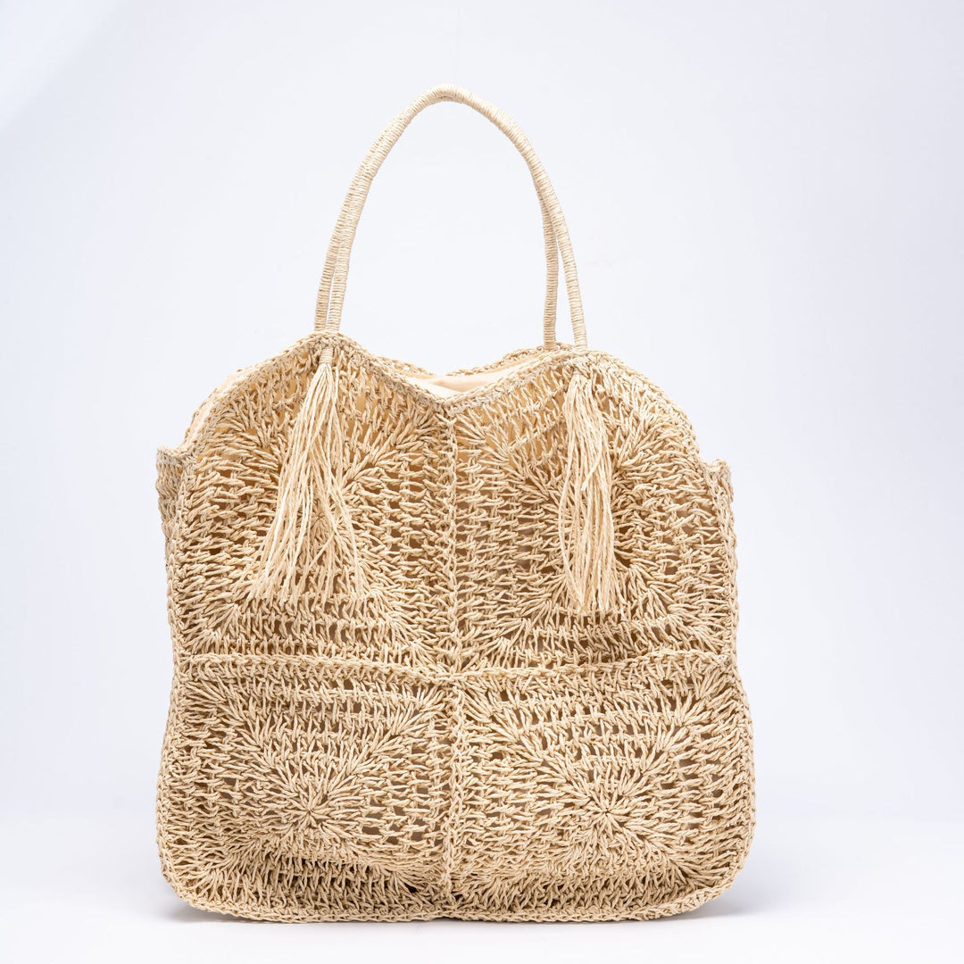 Handcrafted straw beach bag with decorative fringes Kalsten