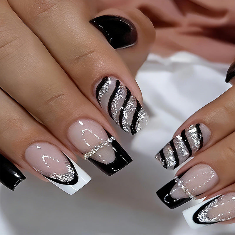 Elegant artificial nails with glitter and stripe accents Kalsten
