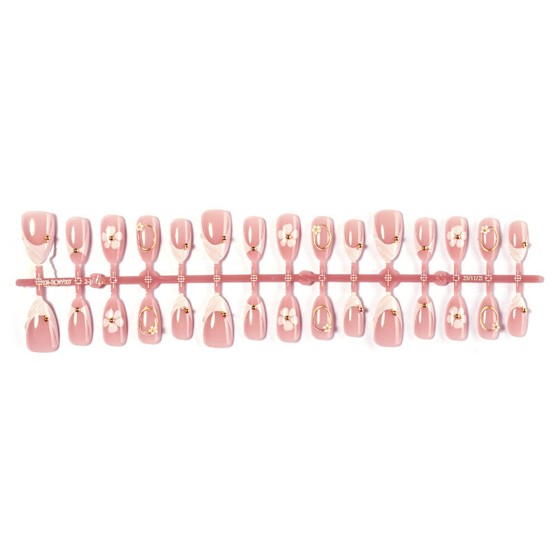 Artificial nail set with elegant flower and glitter accents Kalsten