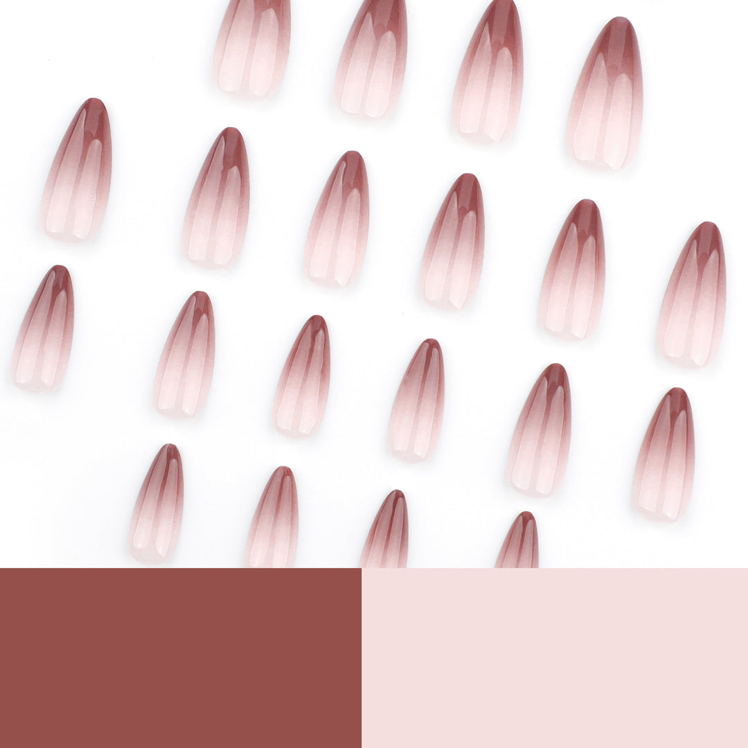 Artistic stiletto nails with elegant ombre design Kalsten