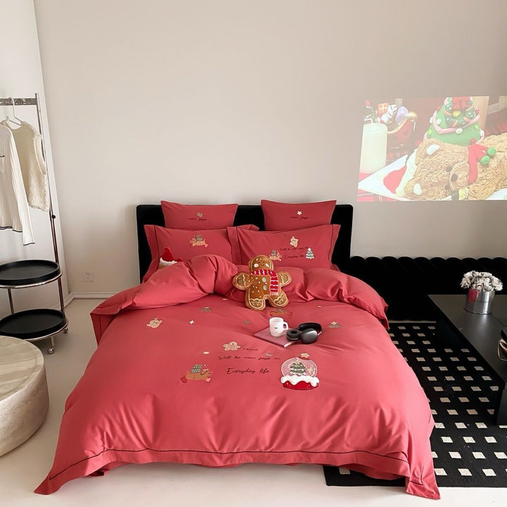 Festive cotton satin bedding set with embroidered Christmas motifs and contrasting borders