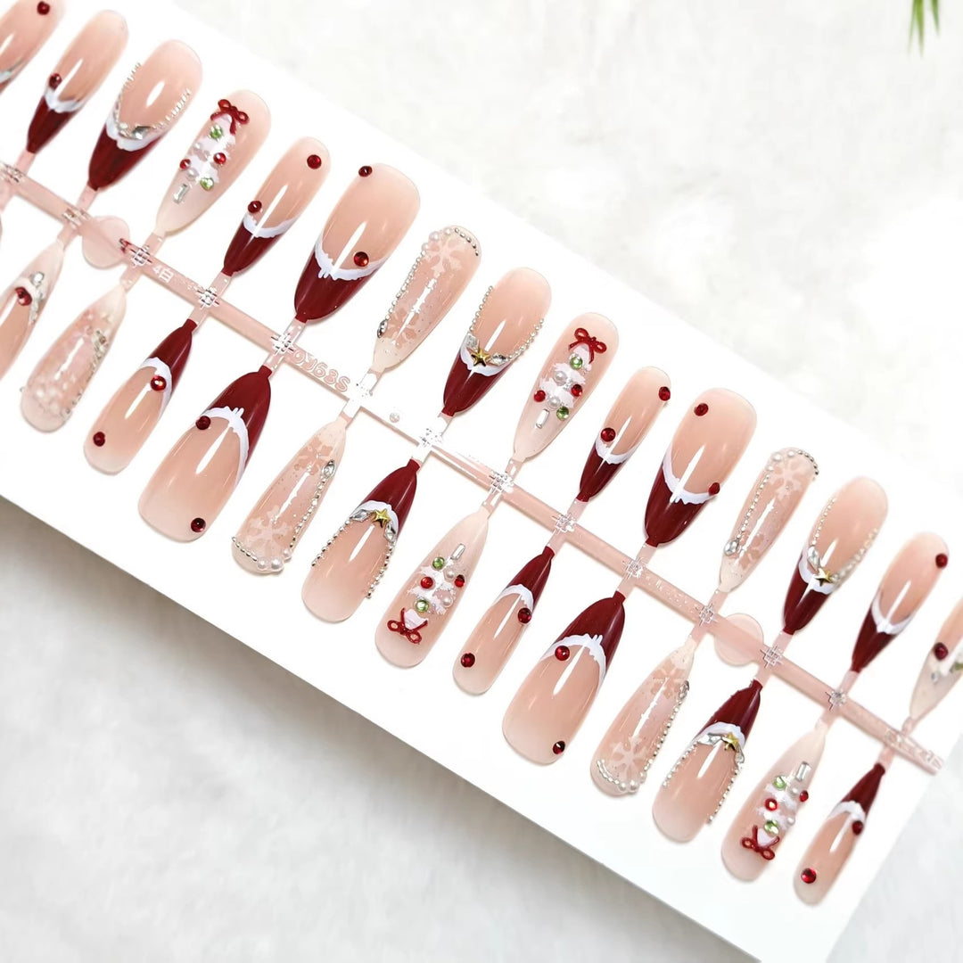 Artificial nails with festive designs and glitter accents Kalsten