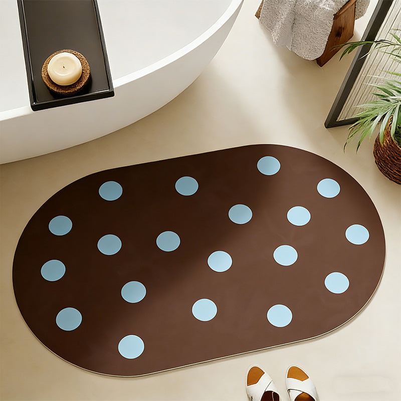 Wipeable placemat made of PVC with large polka dot pattern and non-slip backing Kalsten