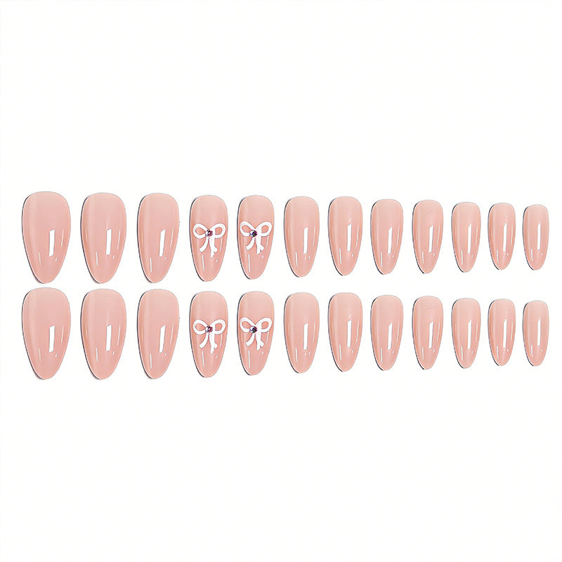 Artificia nails with delicate bow accents Kalsten