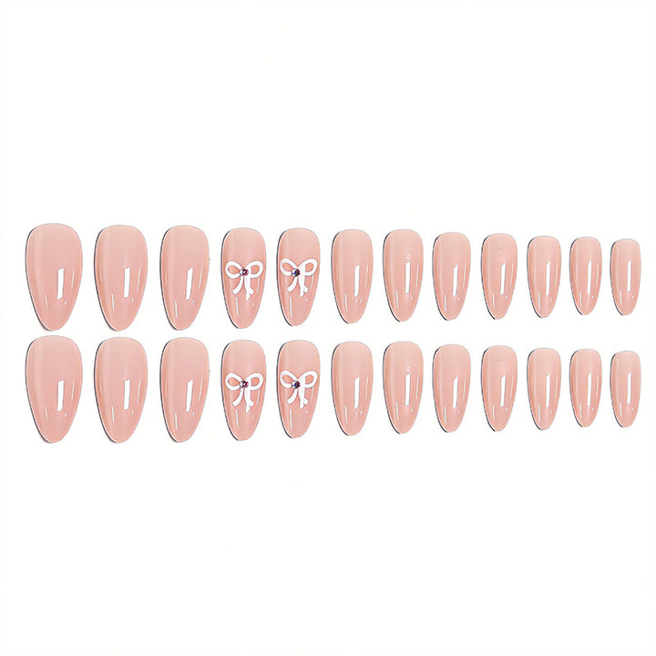 Artificia nails with delicate bow accents Kalsten