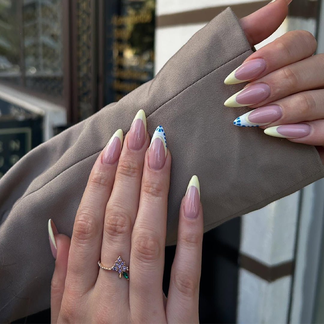 Artistic Stiletto Nail Design with Gradient Tips