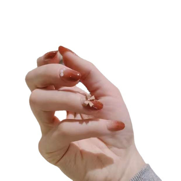 Artificial nails with glamorous bow and pearl decor Kalsten