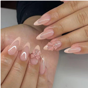 Artificial nail set with elegant tips and romantic bow decorations Kalsten