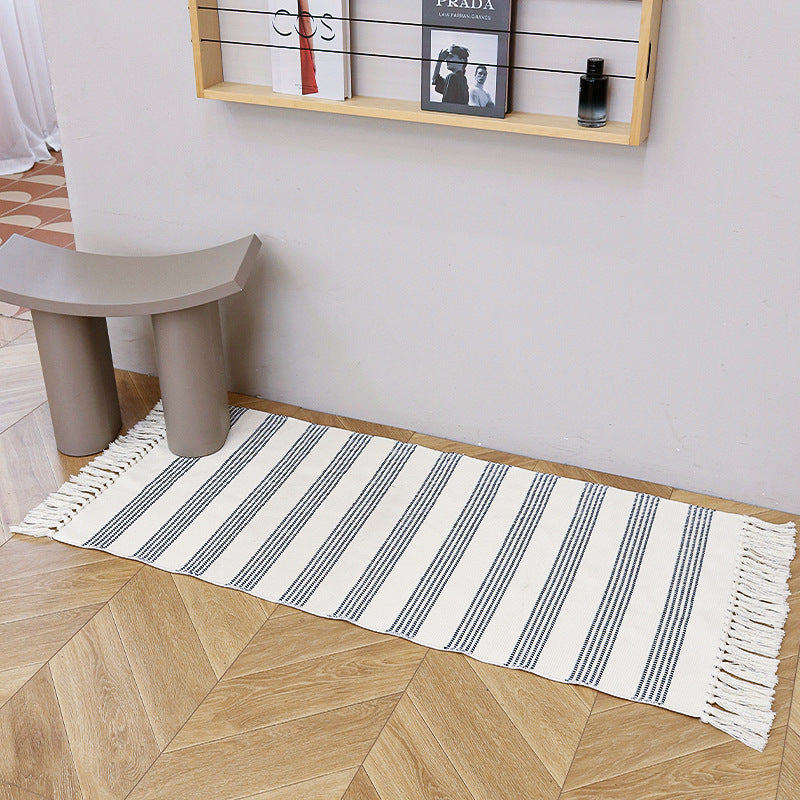 Woven cotton blend bath mat in buffalo check with flat weave structure Kalsten
