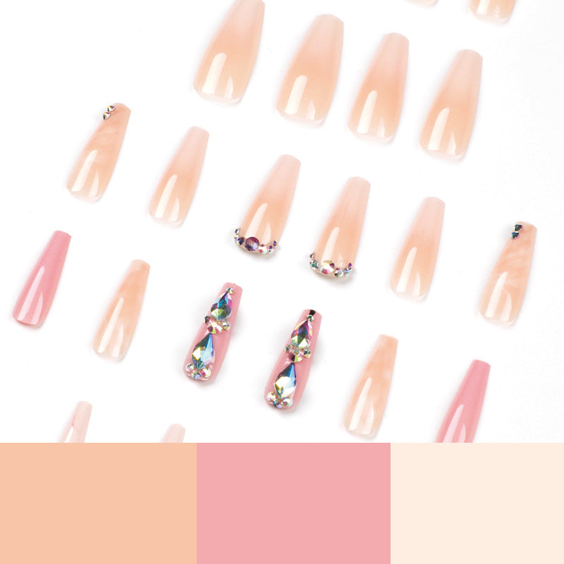 Glamorous artificial nails with gemstone embellishments Kalsten