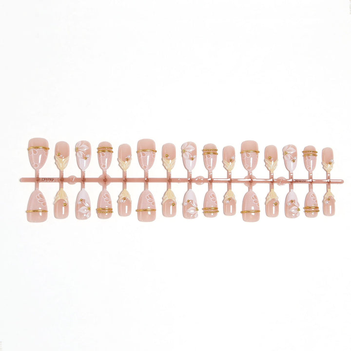 Artificial nail set with enchanting floral details and luxurious gold accents Kalsten