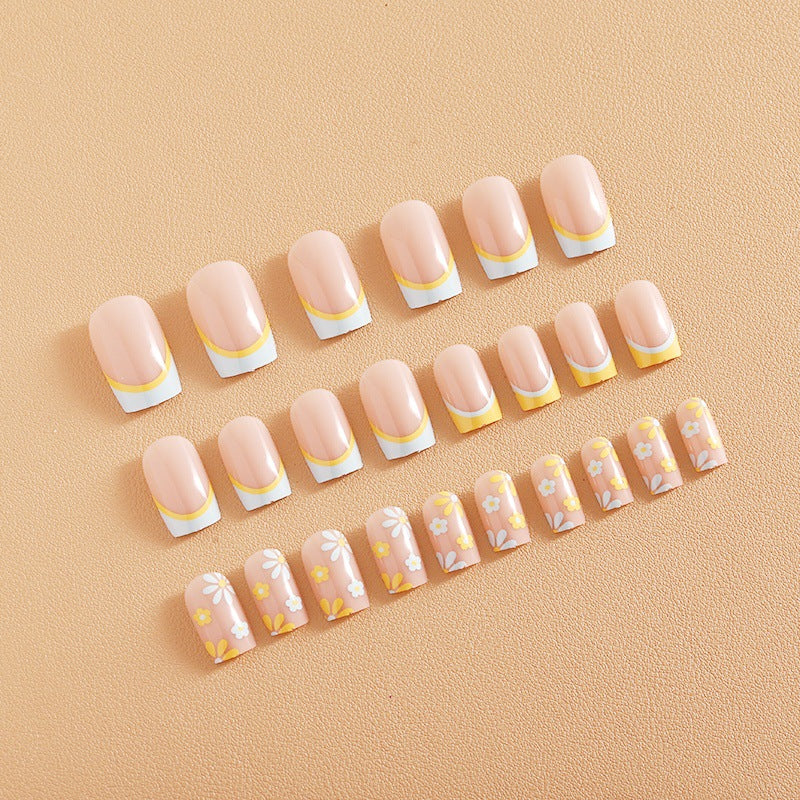 Nail art set with creative floral designs and elegant French finish Kalsten