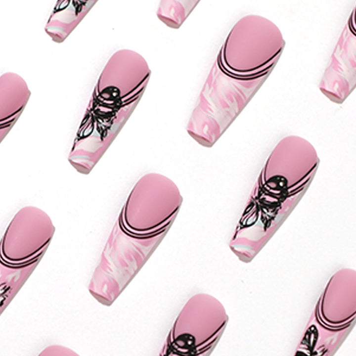 Artificial nail art with delicate butterfly designs Kalsten