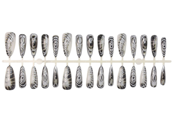 Artificial nail set with modern spiral pattern and shiny accents Kalsten
