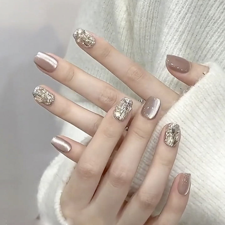 Artful nail extensions with glamorous glitter design Kalsten