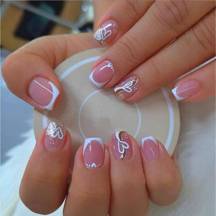 Elegant Heart-Embellished Nail Art Design Kalsten
