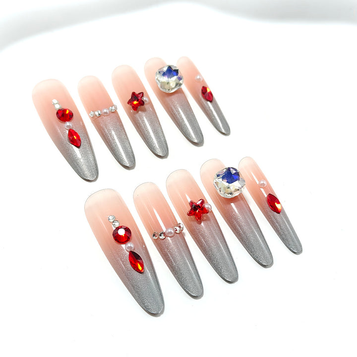 Glamorous artificial nails with rhinestones and embellishments Kalsten