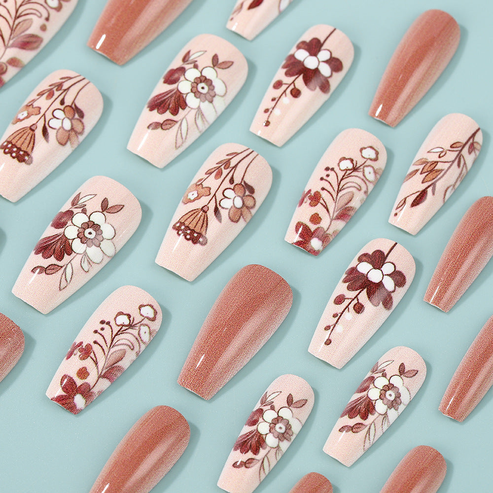 Artificial nails with filigree flower designs Kalsten