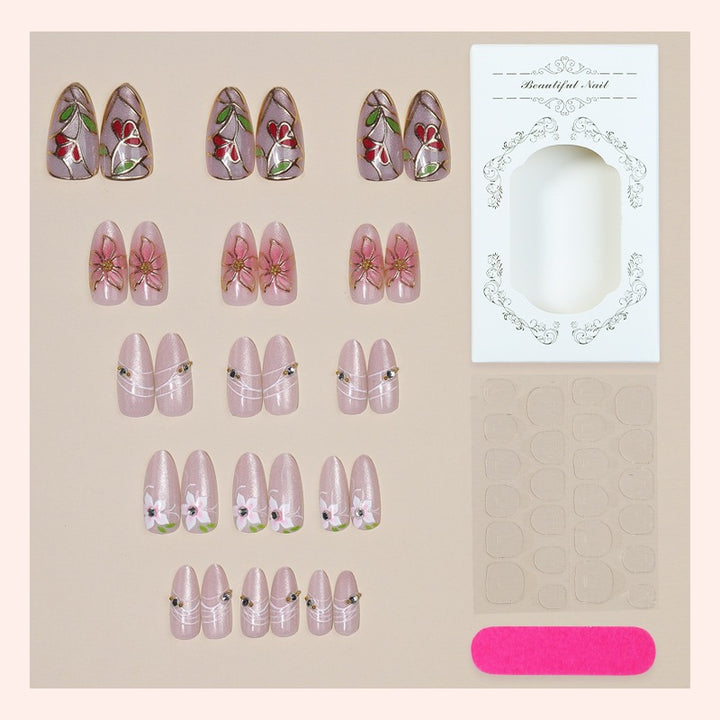 Artificial nail set with luxurious floral designs and glitter accents Kalsten