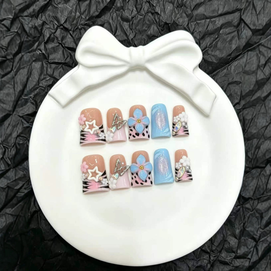 Artistic Nail Art Press-On Set with Floral and Gem Accents