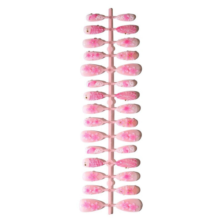 Artificial nail set with intricate 3D flowers and elegant accents Kalsten