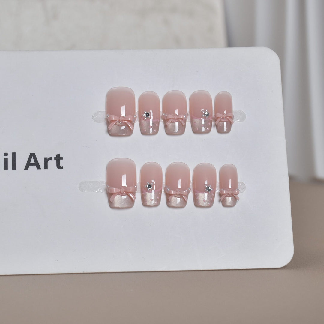 Elegant French Tip Press-On Nail Art with Bow Accents Kalsten