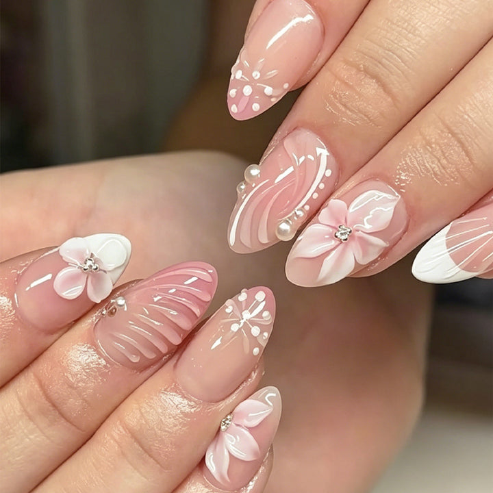 Acrylic nail set with elegant 3D flowers and embellished details Kalsten