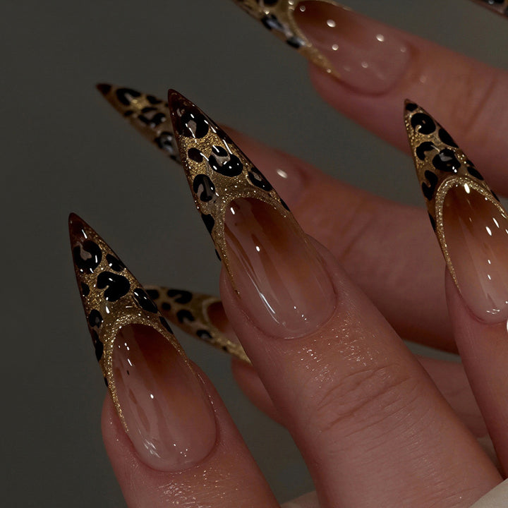 Elegant Stiletto Nail Art Set with Gold and Leopard Accents Kalsten