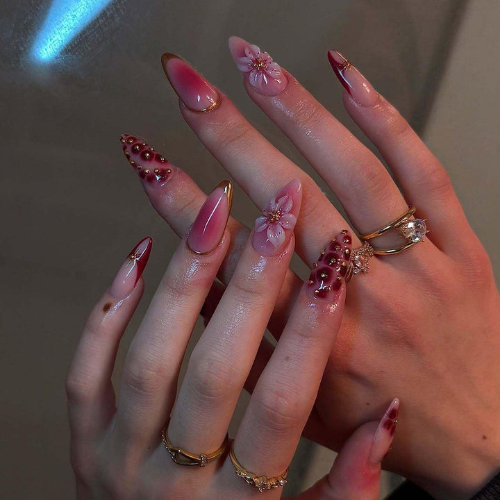 Artificial nails with floral and glitter accents Kalsten