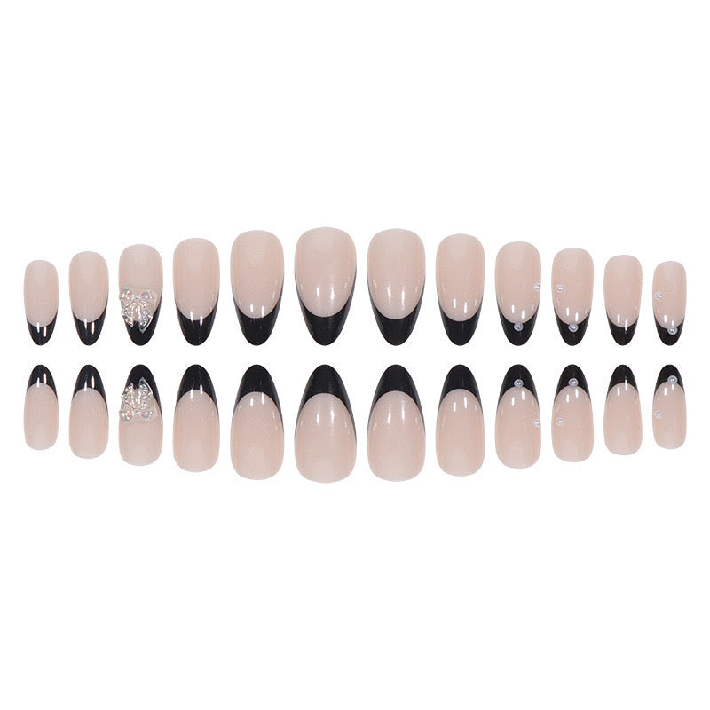 Artificial nail set with glossy French design and delicate 3D accents Kalsten