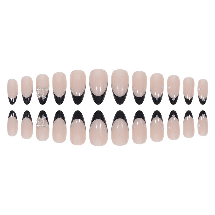 Artificial nail set with glossy French design and delicate 3D accents Kalsten