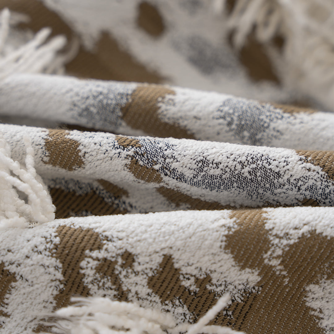 Beef woven seat pouf with boho tassels and textured tufted surface