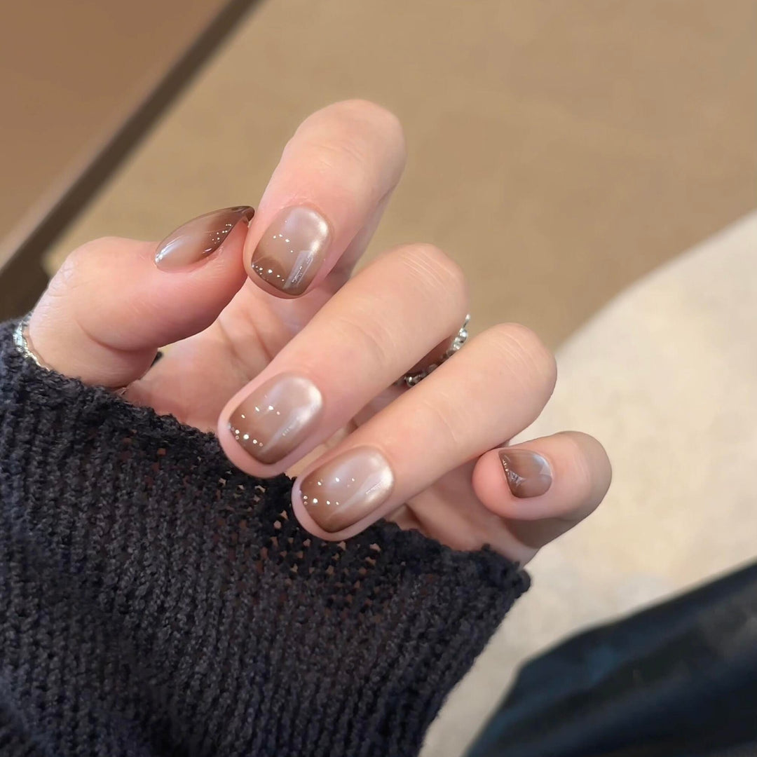 Artificial nails with elegant gradient color and glitter elements Kalsten