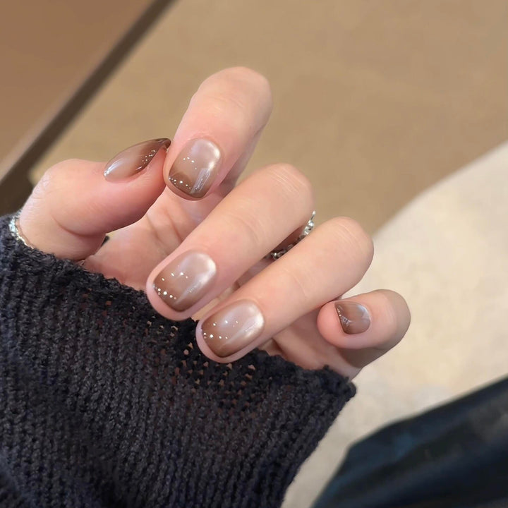 Artificial nails with elegant gradient color and glitter elements Kalsten