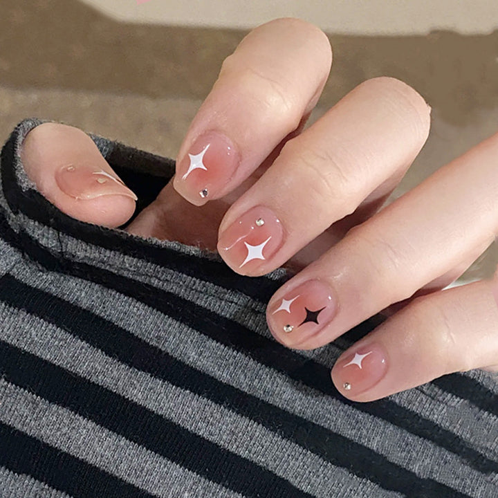 Acrylic nail set with sparkling star decorations and elegant accents Kalsten