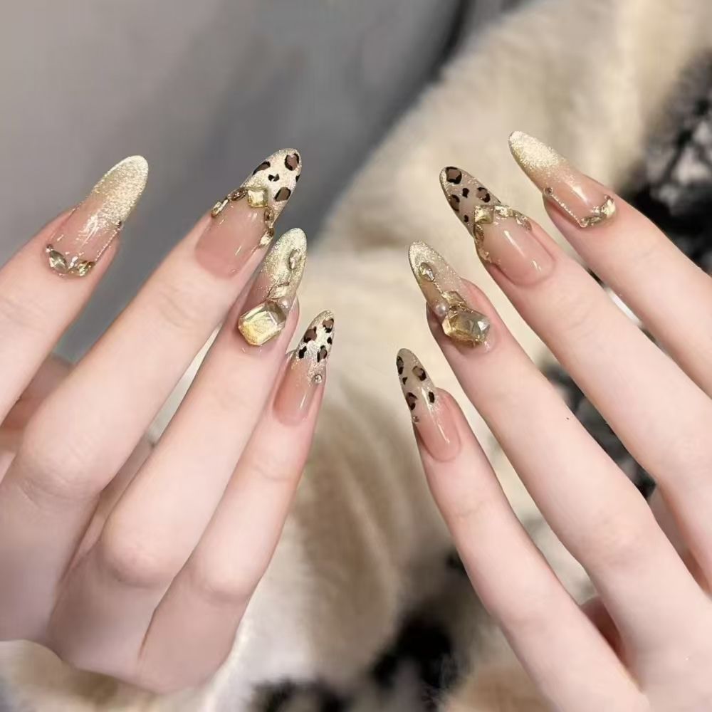 Artificial nails with elegant leopard design and glitter effects Kalsten