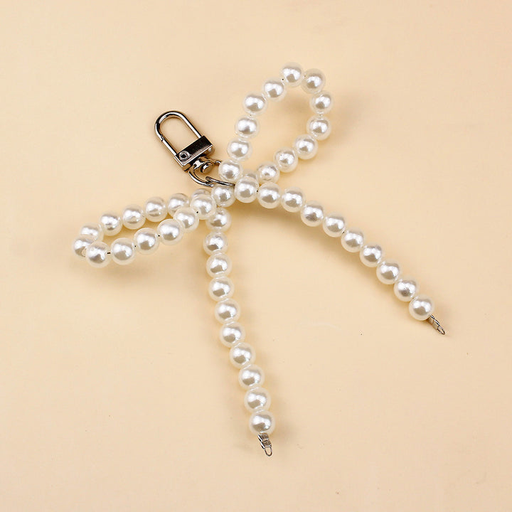 Elegant Pearl Bow Brooch Kalsten